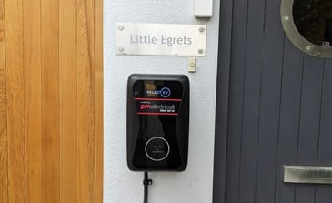 EV Charger installation, project EV, mounted on wall of house