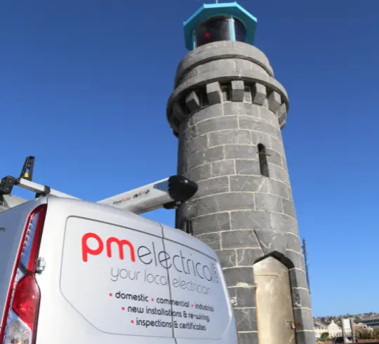 PM electrical van next to Teignmouth landmark